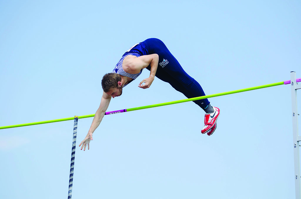 Christian Lucchesi (Jr, Milwaukee, Wis.) competing in the pole vault at the WIAC championships in Whitewater, Wis.