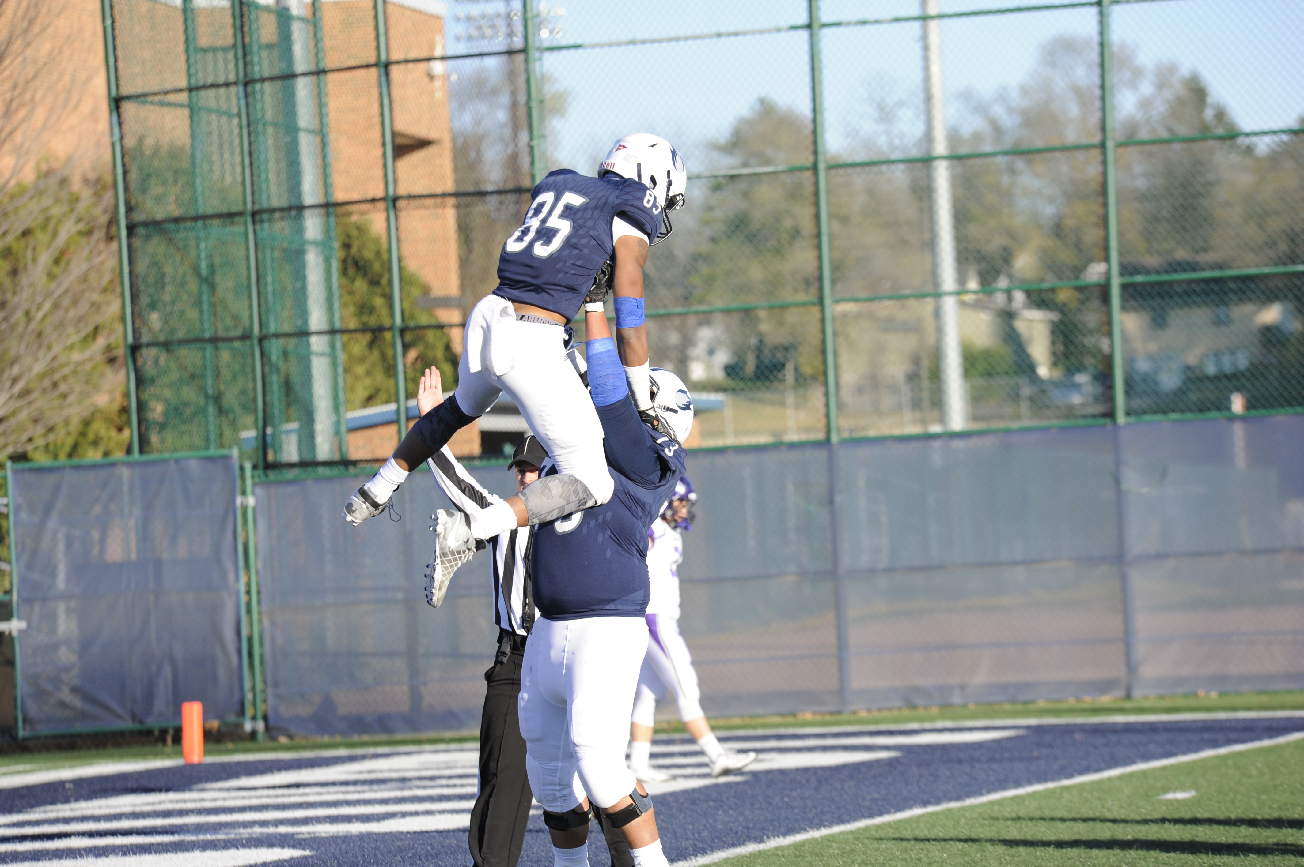 Offensive lineman Kane’ala Atchison-Keolanui (Sr, Lodi, Wis) celebrating with wide receiver Brian Sandifer (Jr, St. Paul, Min) after scoring a touchdown against nationally ranked UW–Whitewater. 