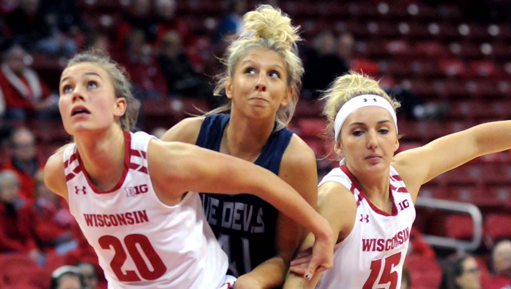 Jenna Goldsmith (Sr, St. Anthony, Min) battling for the ball during the exhibition that UW-Stout played against UW-Madison at the Kohl Center on November 8th.