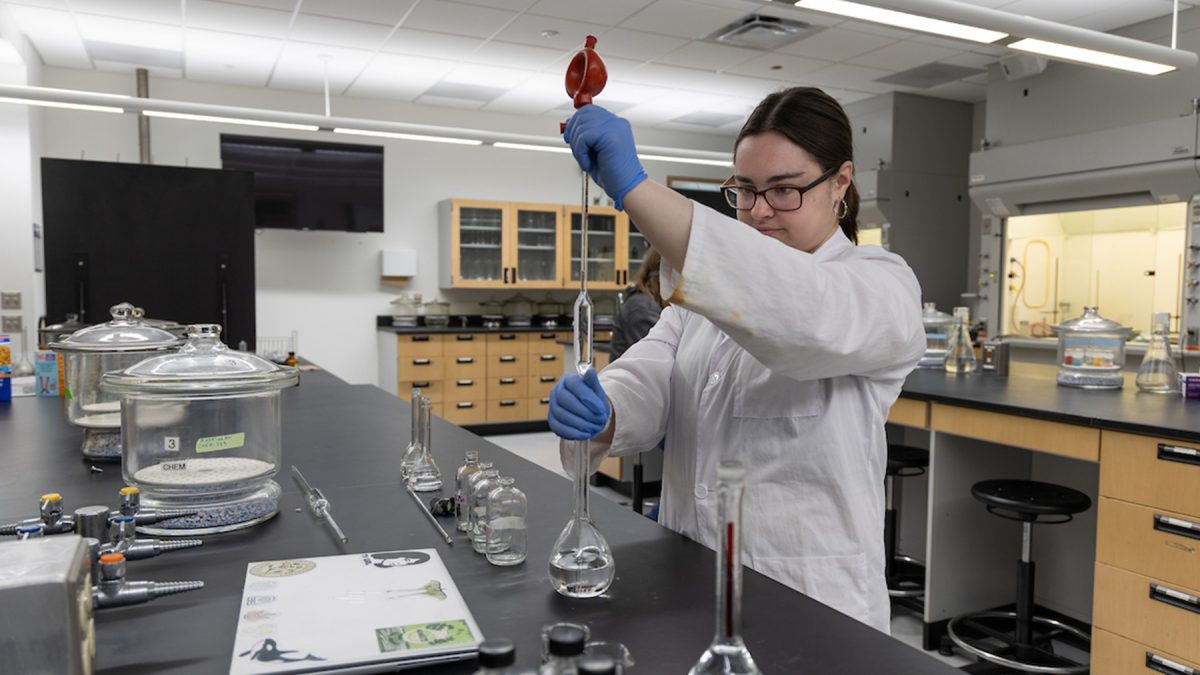 Biochemistry and molecular biology student Riley Strobush tests heavy metals in nicotine salts.